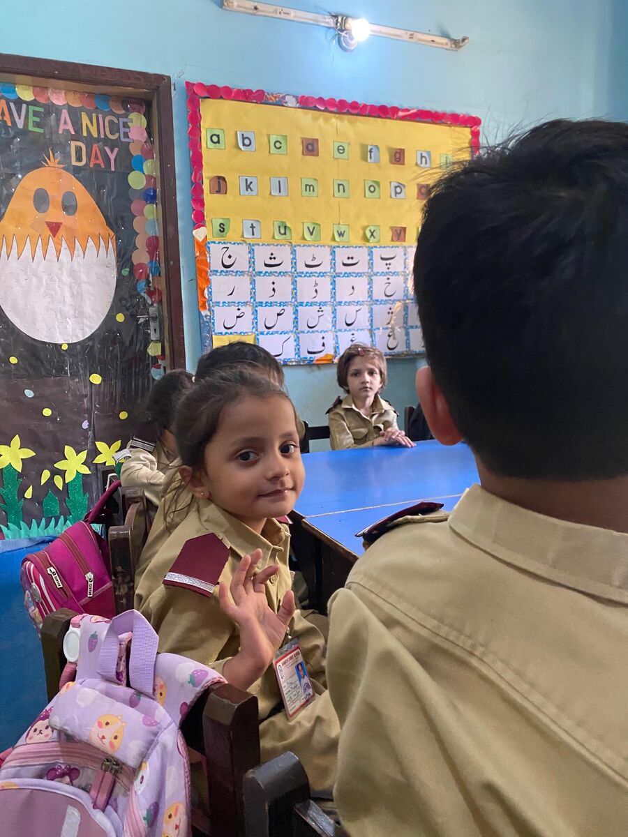 Young pupils in a bright junior classroom