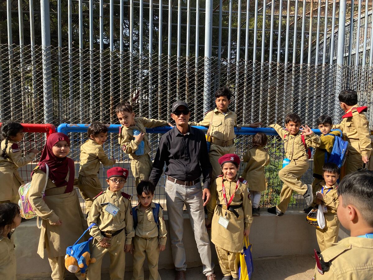 Young cadets with a teacher on a trip to the zoo
